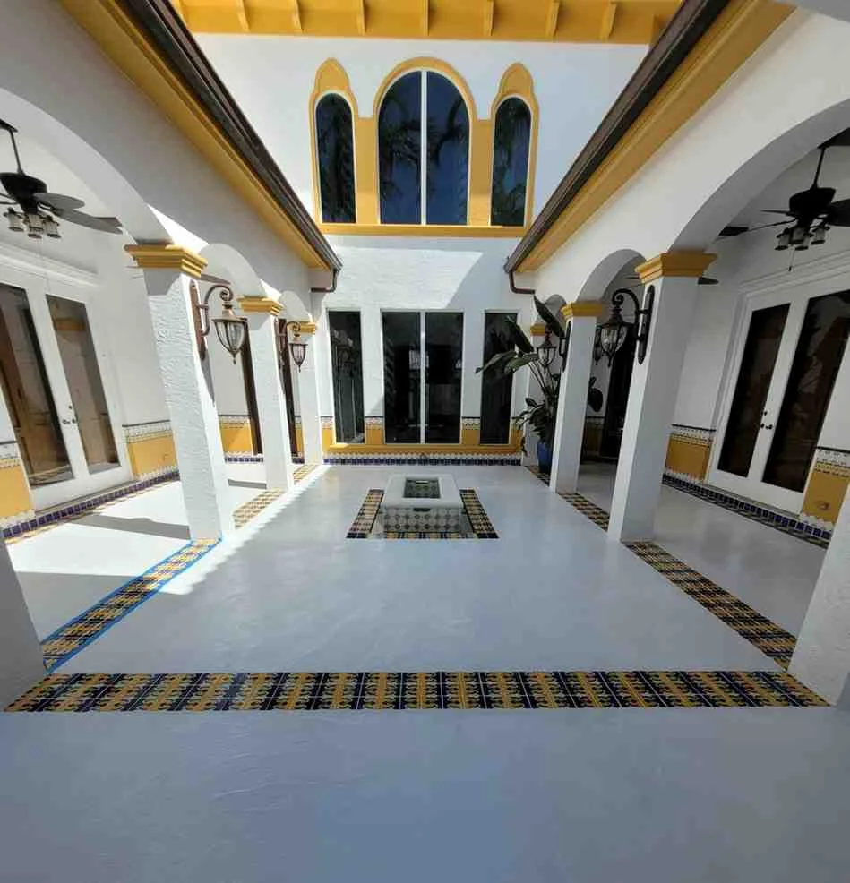 Luxury architectural interior with polished concrete floors and decorative tile work
