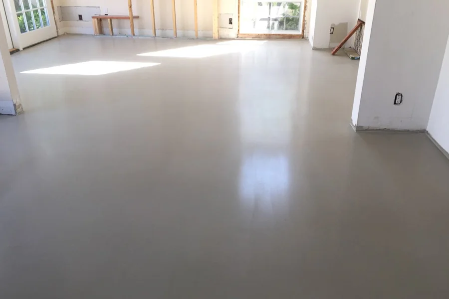 Floor leveling and polished overlay application